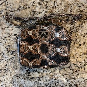Kelly Wynne Mingle Mingle Mini Crossbody snakeskin, carried 2 times.